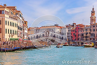 Venice, Italy - March 27, 2019: Beautiful vivid view of the famous Rialto Bridge Ponte Di Rialto over the Grand Canal Editorial Stock Photo