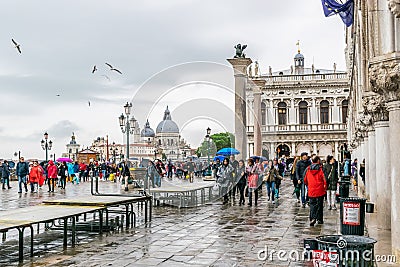 Rainy day in Piazza San Marco St Marks Square with Doges Palace on the right in Venice, Italy Editorial Stock Photo