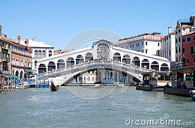 Venice, Italy, Rialto Bridge, Canal-Grande, the most famous bridge in Venice with a gondola Editorial Stock Photo
