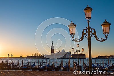 Venice Italy seafront with gondolas and lanterns Stock Photo