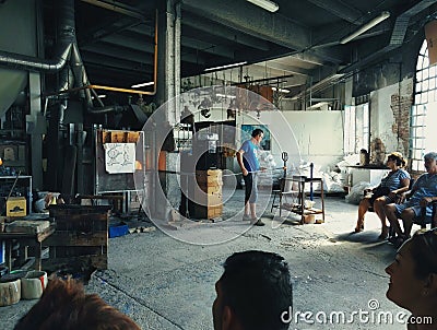 Venice, Italy - September 03, 2018: A glass worker making a glass in front of tourists in a small island called Burano Editorial Stock Photo