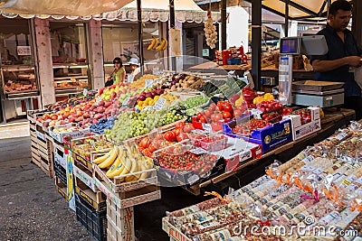 Venice, Italy - september 2016: Rialto fish markets. Vegetables, fruits, spices are on counter. Editorial Stock Photo