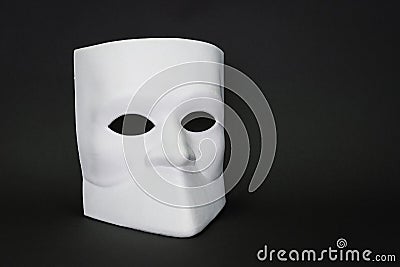 Venice Mask Bauta, Casanova mask on dark background. Concept - Venice carnival-masquerade, festival, travels, holiday. Copy space. Stock Photo