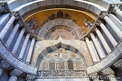 Venice, Saint Mark basilica facade details with golden mosaics in Italy Stock Photo