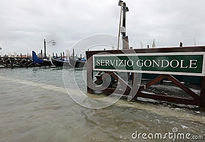 Venice, VE, Italy - November 12, 2019: Moored Gondola boat and Editorial Stock Photo