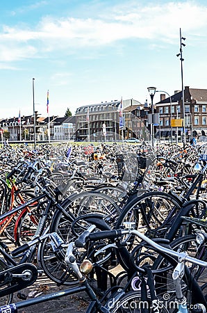 Venlo, Limburg, Netherlands - October 13, 2018: Rows of parked bicycles in the Dutch city close to the main train station. City Editorial Stock Photo