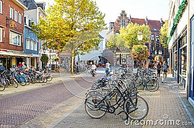 Venlo, Limburg, Netherlands - October 13, 2018: Shopping street in the historical center of the Dutch city. Bicycles parked on Editorial Stock Photo