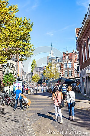 Venlo, Limburg, Netherlands - October 13, 2018: Shopping street in the historical center of the Dutch city. People walking on the Editorial Stock Photo