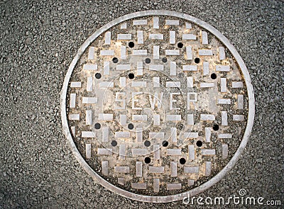 Vented Manhole Sewer Main Cover Asphalt Side Street Water Drain Stock Photo