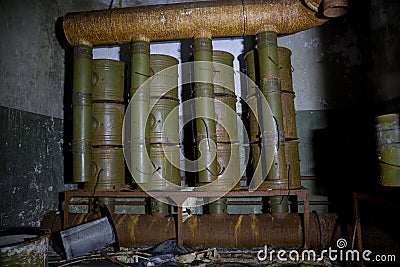 Ventilation chamber in abandoned Soviet bunker. Rusty filter ventilation equipment Stock Photo