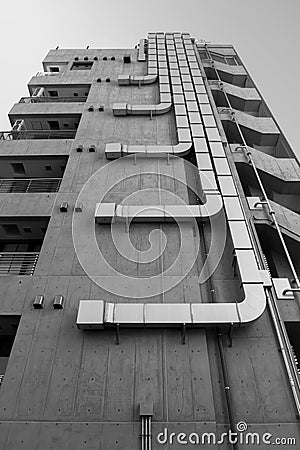 Ventilation duct on the side of the building in the city. Black and White Stock Photo