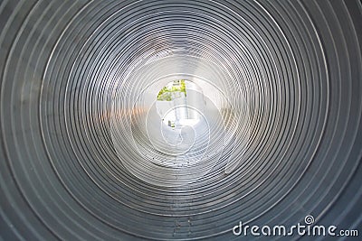 The ventilation pipe is round from the inside. Steel pipes, parts for the construction of industrial air conditioning Stock Photo