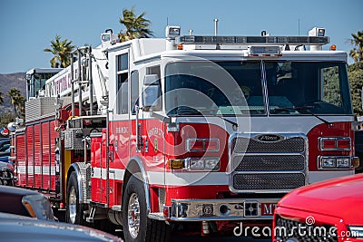 Fire engines and fire trucks from the Ventura City Fire Department at a training session at Harbor Cove Beach at Ventura Harbor. Editorial Stock Photo