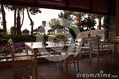 Veranda with dining table and garden view Stock Photo