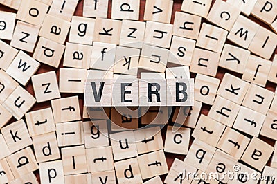Verb word concept on cubes Stock Photo