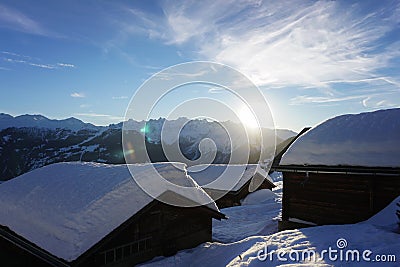 Verbier sunset over mountain huts Stock Photo