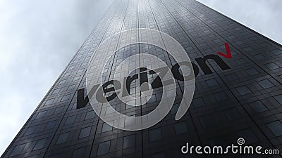 Verizon Communications logo on a skyscraper facade reflecting clouds. Editorial 3D rendering Editorial Stock Photo