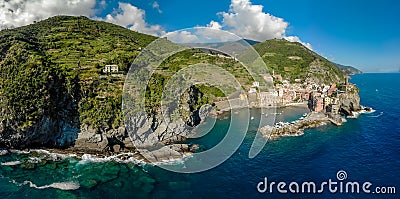 Vernazza - Village of Cinque Terre National Park at Coast of Italy. Province of La Spezia, Liguria, in the north of Italy - Aerial Stock Photo