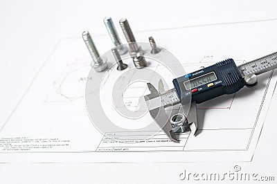 Vernier caliper with screw, nuts and bolts Stock Photo
