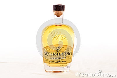 A small bottle of scotch whiskey on a white background. Editorial Stock Photo