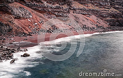 Verodal beach, red volcanic sand beach Stock Photo