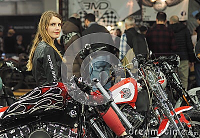 Verona, Italy - january 20, 2018: motor bike expo, girl posing on Harley Davindson Editorial Stock Photo