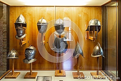 Armor of various shapes at the exhibition in the Castelvecchio Museum of the Castelvecchio Castello Scaligero fortress in Verona, Editorial Stock Photo