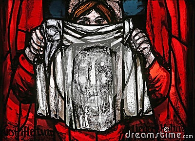 Veronica holding her veil, Dark sun of Good Friday, detail of stained glass window in St James church in Hohenberg, Germany Editorial Stock Photo