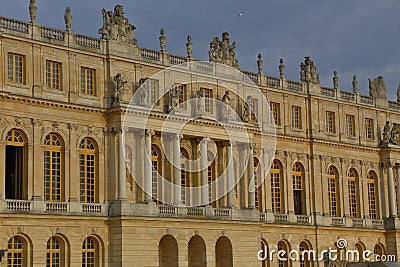VERSAILLE FRANCE: Chateau de Versailles at sunset with fountain, the estate of Versaille was the home and court of Louis XIV, Fr Editorial Stock Photo