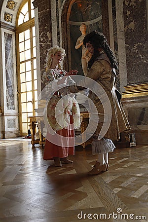 VERSAILLE FRANCE: Historical reenactors at the Chateau de Versailles, the estate of Versaille was the home and court of Louis XIV Editorial Stock Photo