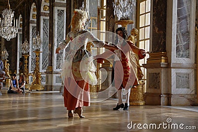 VERSAILLE FRANCE: Historical reenactors at the Chateau de Versailles, the estate of Versaille was the home and court of Louis XIV Editorial Stock Photo