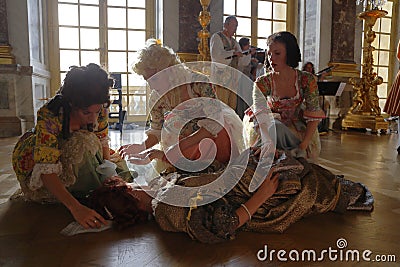 VERSAILLE FRANCE: Historical reenactors at the Chateau de Versailles, the estate of Versaille was the home and court of Louis XIV Editorial Stock Photo