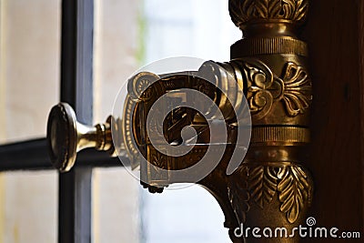 Versailles / France - January 05 2012: Beautiful handle opening the window frame. Editorial Stock Photo