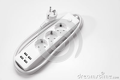 a versatile modern white extension cord with sockets and usb ports Stock Photo