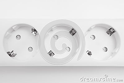 a versatile modern white extension cord with sockets Stock Photo