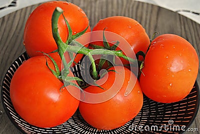 Verse tomaten op een bord Stock Photo