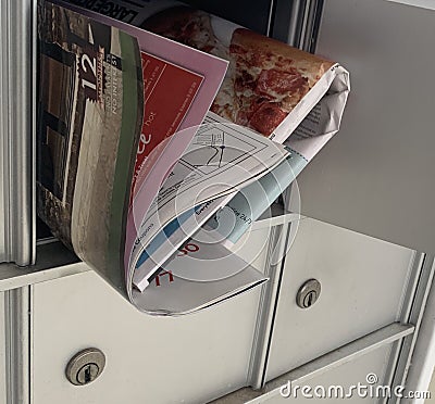 Junk Mail Flyers and Unsolicited Offers Editorial Stock Photo