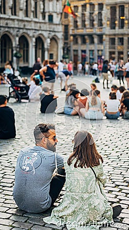 Vertcial shot of people and tourists exploring the cultural city of Brussels, Belgium Editorial Stock Photo