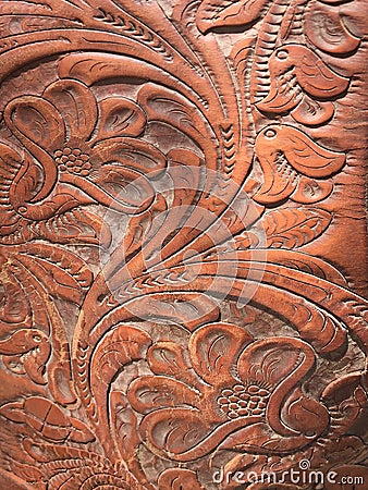 Close-up detail of old vintage tooled leather saddle in Tucson Arizona Stock Photo