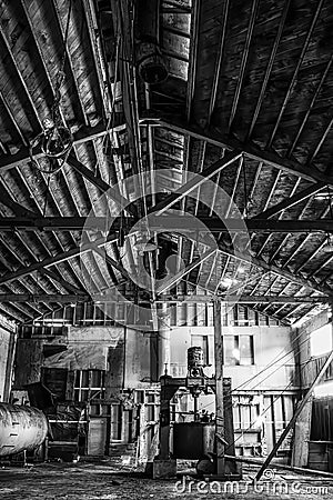 Vertical Black and White Interior Abandoned Warehouse Cannery in Monterey California Stock Photo