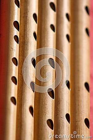 India, Vertical Close up of the holes of hindu bamboo flute called Bansuri. Stock Photo