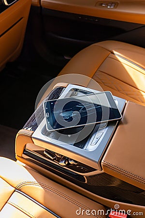 Vertical closeup of BMW rear seats integrated tablet Editorial Stock Photo