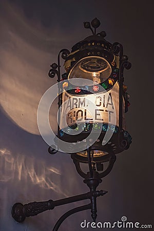Vertical closeup of a colorful lamp of Pharmaceutical museum of Matanzas, Cuba Editorial Stock Photo
