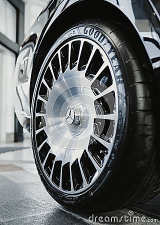 Vertical closeup shot of a Good Year tire on a luxury CLS53 AMG Mercedes car Editorial Stock Photo