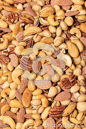Vertical closeup shot of tasty salted mixed nuts Stock Photo