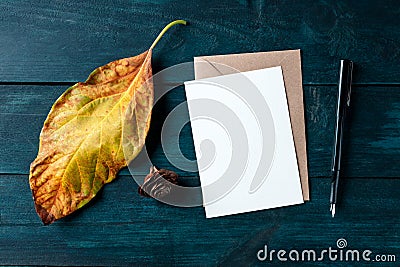 A vertical A5 greeting card or invitation, autumn stationery mockup, flatlay, top shot Stock Photo