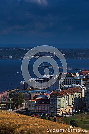 Vertical high angle shot of the buildings near the sea in Coruna city, Galicia, Spain Editorial Stock Photo