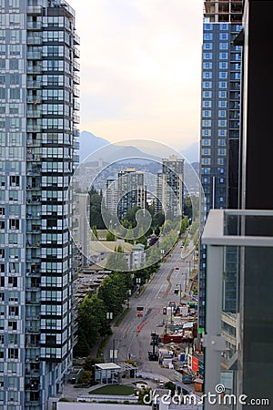 Vertical of the highway roads captured between the residential buildings in Surrey in Canada at dusk Editorial Stock Photo