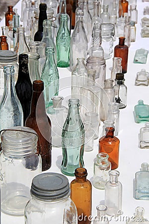 Vertical image of old bottles at flea market, Washington County Fair, New York, 2016 Editorial Stock Photo