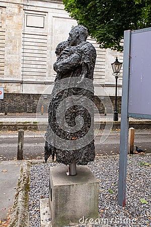 Vertical image of the Return of the Prodigal sculpture by Charlie Mackesy Editorial Stock Photo